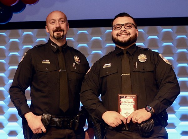 Officer Nicholas Gonzalez and Lemoore Police Department Chief Michael Kendall during the Public Appreciation Luncheon during which Gonzalez accepted his award.